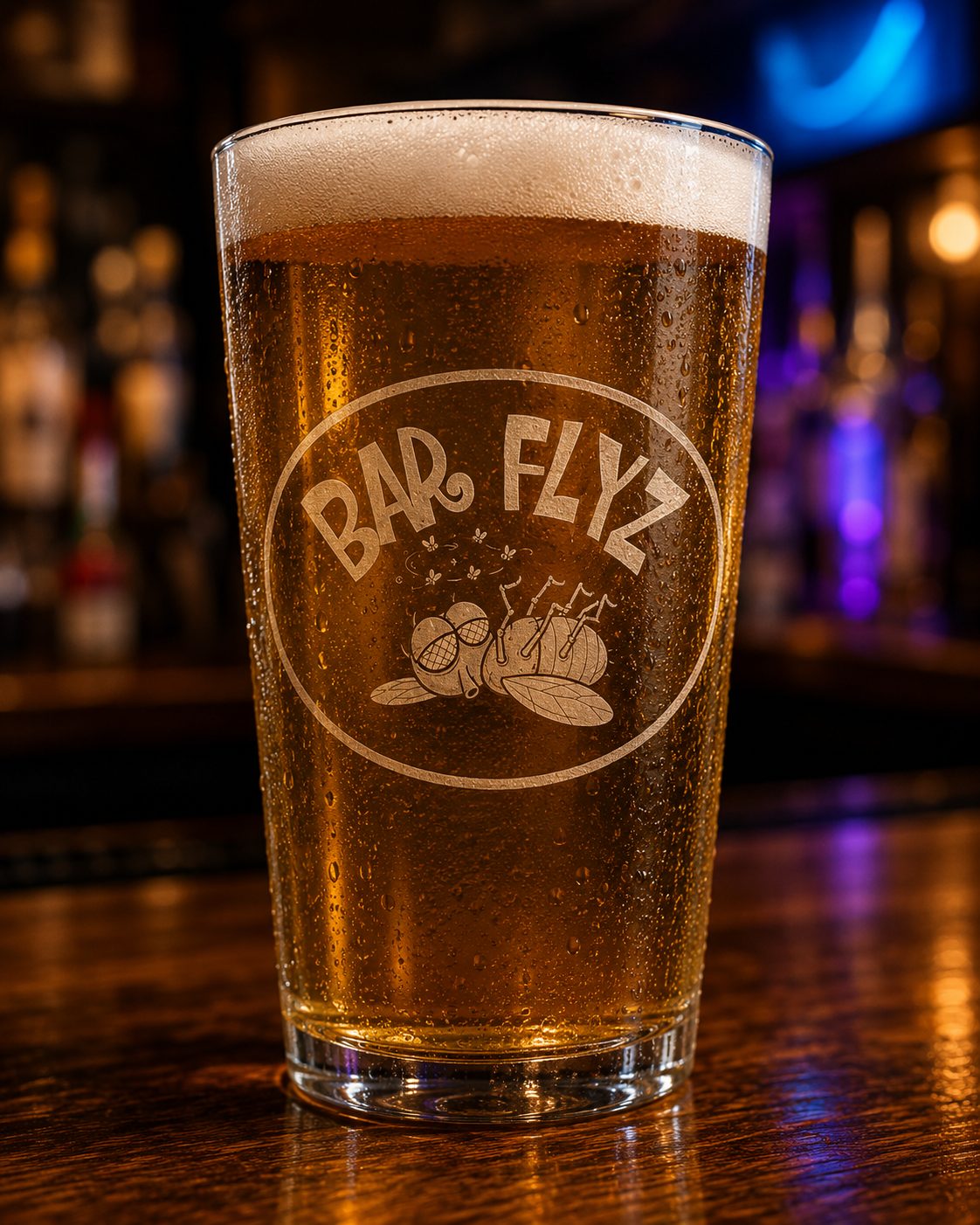 Pint glass laser etched with a bar logo