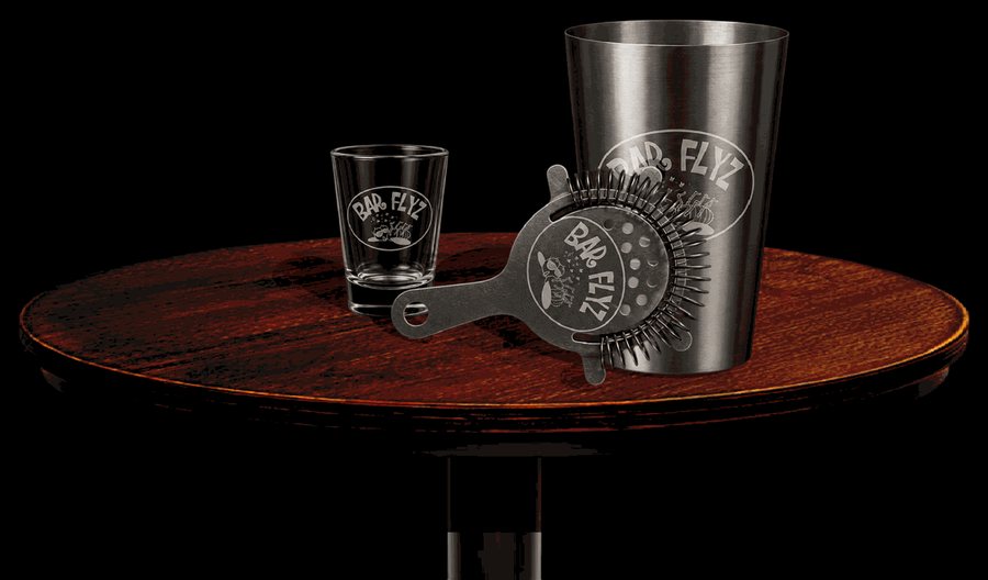 Branded tins and a shot glass