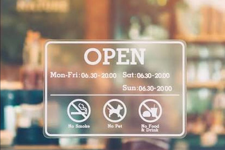 Window cling with opening hours